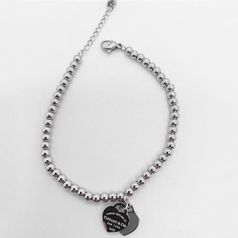 Bolsa de doble corazón al por mayor Titanio de acero Peach Corazón Costeo Amor Epoxi Pulsera Epoxi